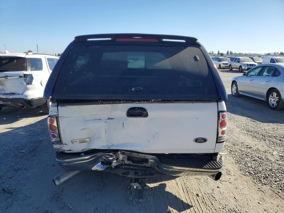 Photo 6 from auction – 1999 FORD F150 with VIN 1FTRX17W4XKA37649