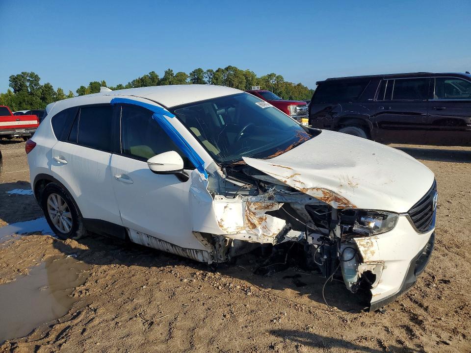 Photo 4 from auction – 2016 MAZDA CX-5 with VIN JM3KE2CY3G0706579