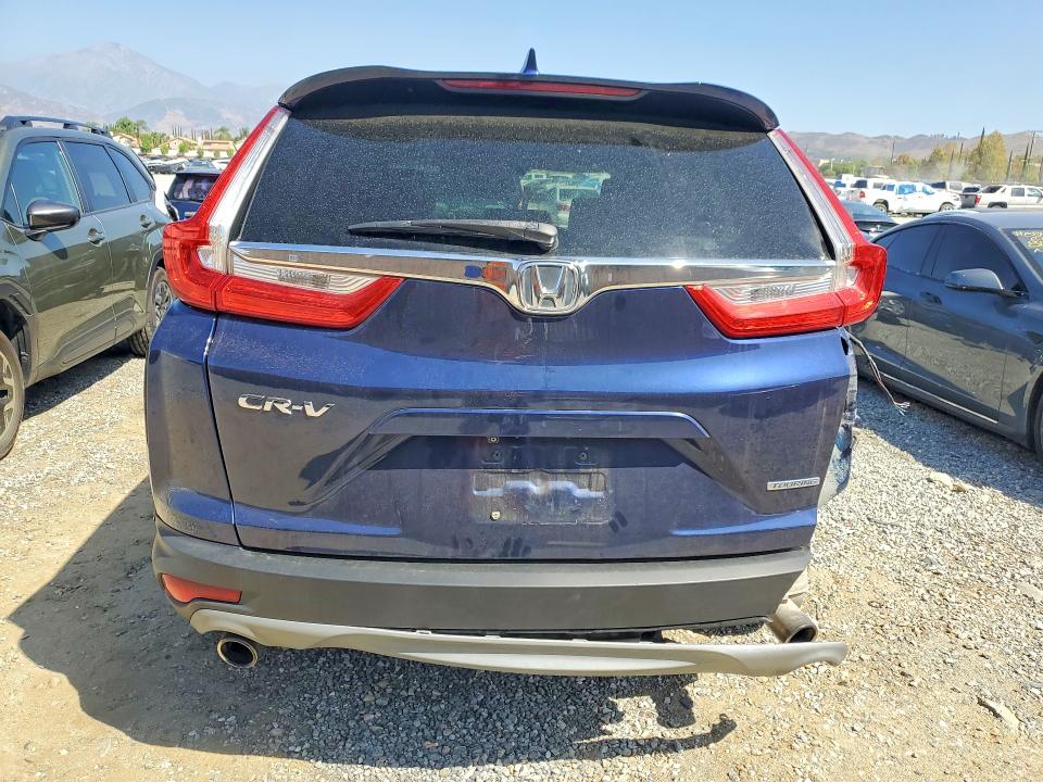 Photo 6 from auction – 2017 HONDA CR-V with VIN 2HKRW1H90HH506618