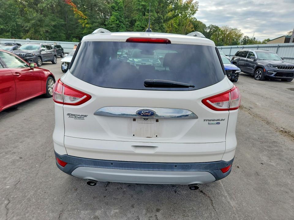 Photo 6 from auction – 2016 FORD ESCAPE with VIN 1FMCU9JX8GUA48619