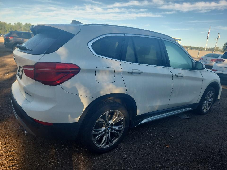 Photo 3 from auction – 2018 BMW X1 with VIN WBXHT3C31J5L29010