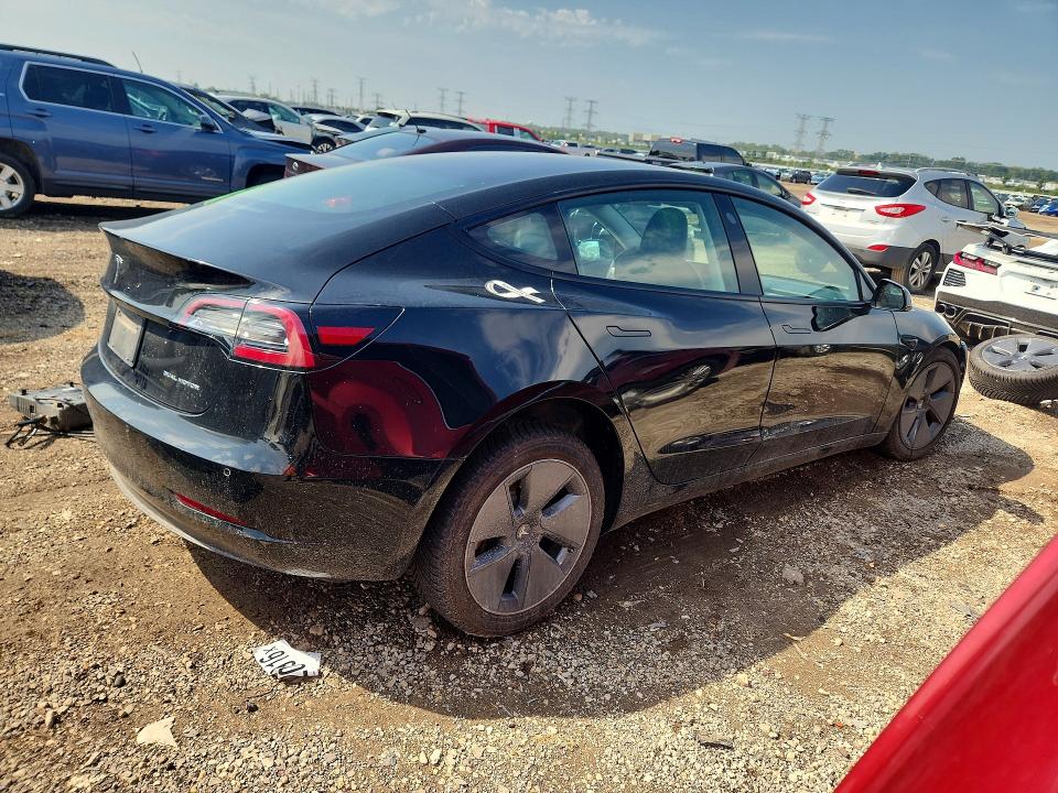 Photo 3 from auction – 2021 TESLA MODEL 3 with VIN 5YJ3E1EB9MF869511