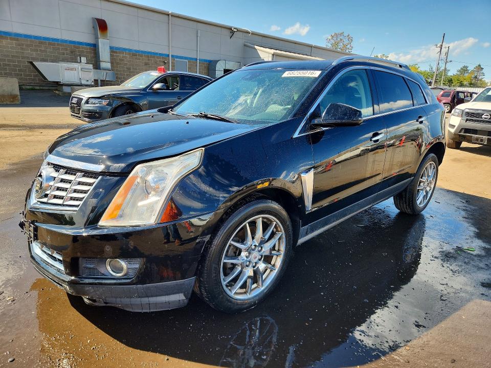 CADILLAC SRX 2014 con VIN 3GYFNCE33ES517609 - Foto de la subasta