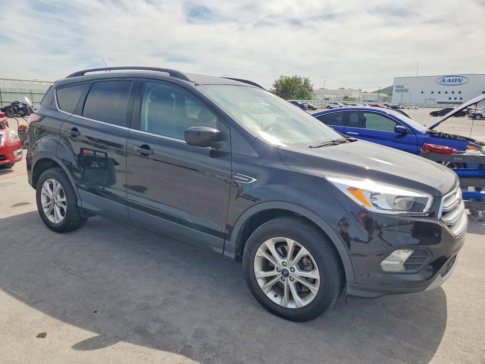 Photo 4 from auction – 2018 FORD ESCAPE with VIN 1FMCU9GDXJUC57963