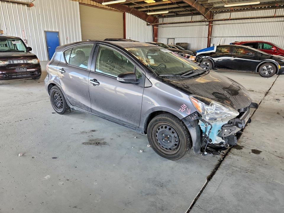 Photo 4 from auction – 2015 TOYOTA PRIUS C with VIN JTDKDTB33F1110050
