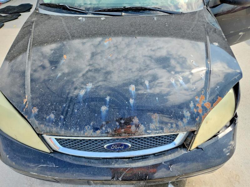 Снимка 11 от търг – 2007 FORD FOCUS с VIN 1FAHP34N97W363786