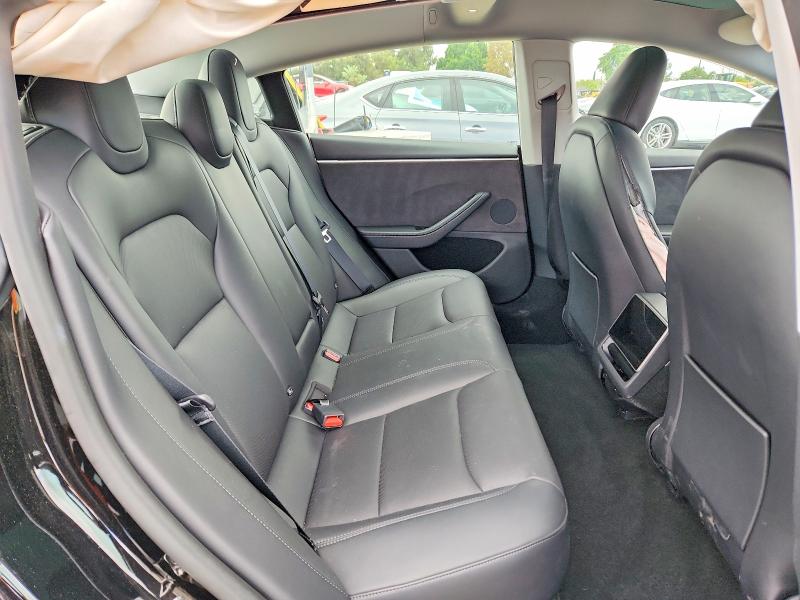 Снимка 10 от търг – 2024 TESLA MODEL 3 с VIN 5YJ3E1EB5RF809393