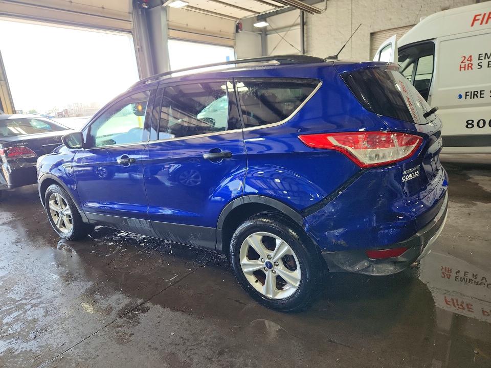 Photo 2 from auction – 2014 FORD ESCAPE with VIN 1FMCU9GX2EUD48340