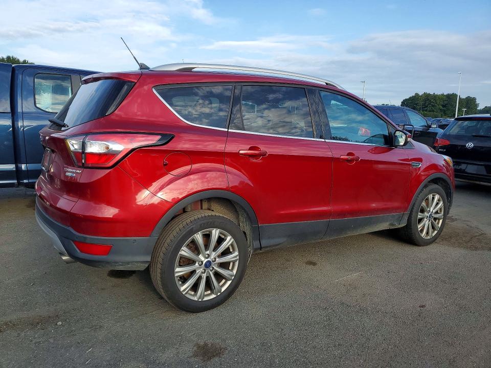 Photo 3 from auction – 2018 FORD ESCAPE with VIN 1FMCU9J95JUC83973