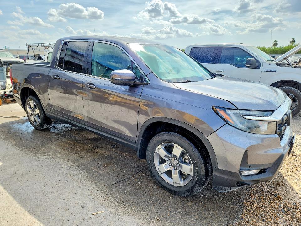 Photo 4 from auction – 2025 HONDA RIDGELINE with VIN 5FPYK3F53SB012186