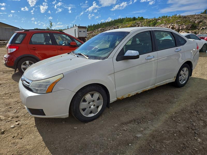 FORD FOCUS 2010 with VIN 1FAHP3FNXAW139527 - Photo from auction