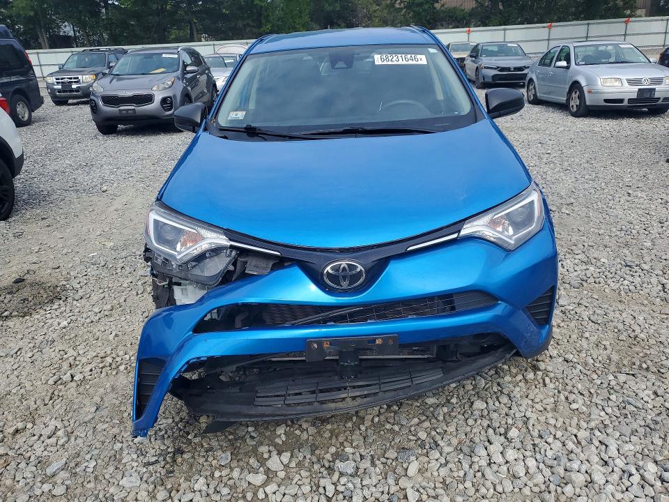 Photo 5 from auction – 2018 TOYOTA RAV4 with VIN JTMBFREV9JJ728833