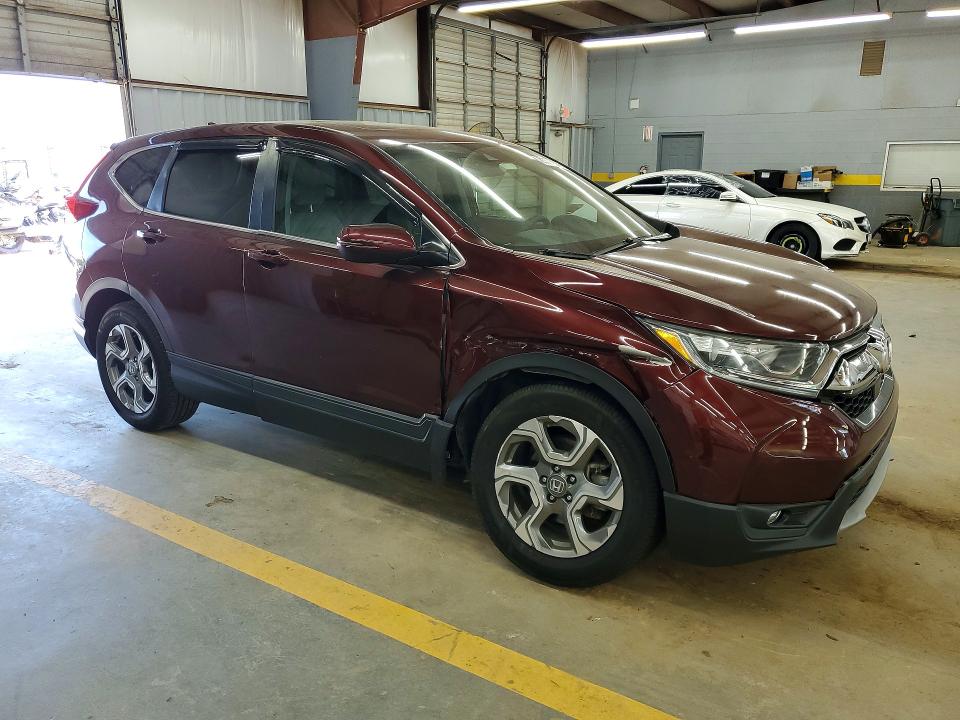 Photo 4 from auction – 2018 HONDA CR-V with VIN 7FARW2H55JE024822