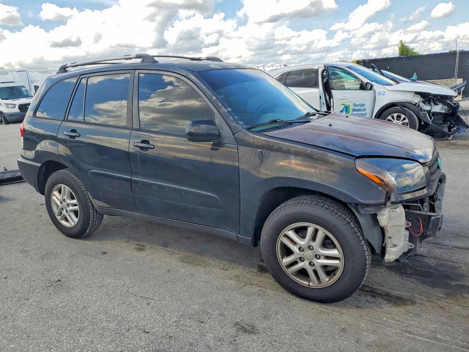 Снимка 4 от търг – 2003 TOYOTA RAV4 с VIN JTEGH20V730092920