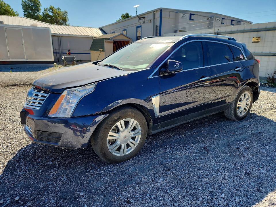 CADILLAC SRX 2015 with VIN 3GYFNEE39FS551812 - Photo from auction