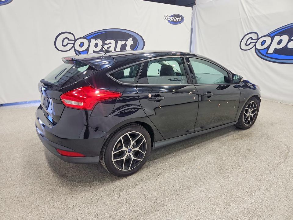 Photo 3 from auction – 2018 FORD FOCUS with VIN 1FADP3M25JL230553