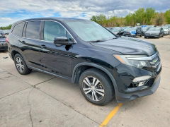 Photo 4 from auction – 2018 HONDA PILOT with VIN 5FNYF6H56JB038338