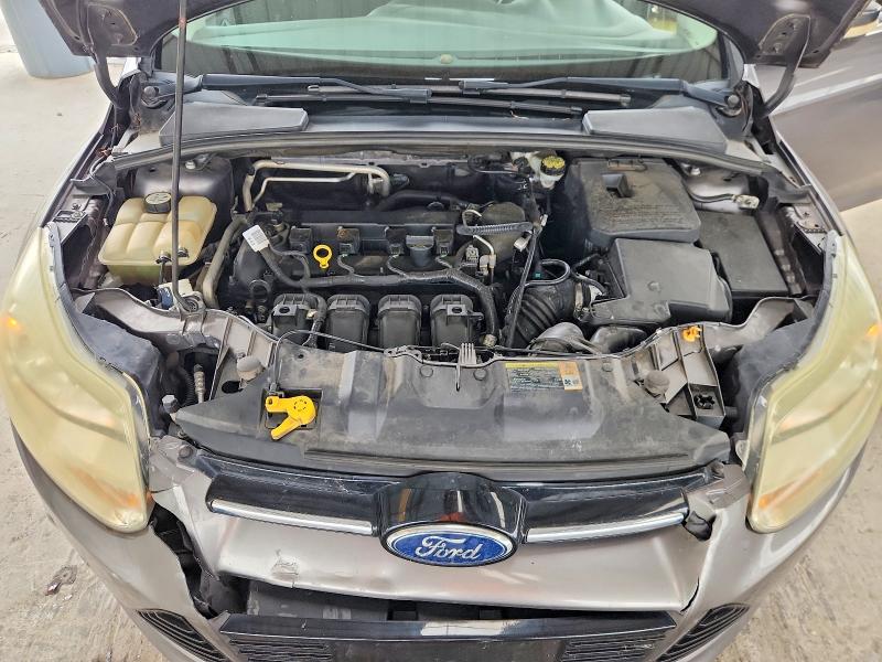 Photo 11 from auction – 2012 FORD FOCUS with VIN 1FAHP3H28CL200638