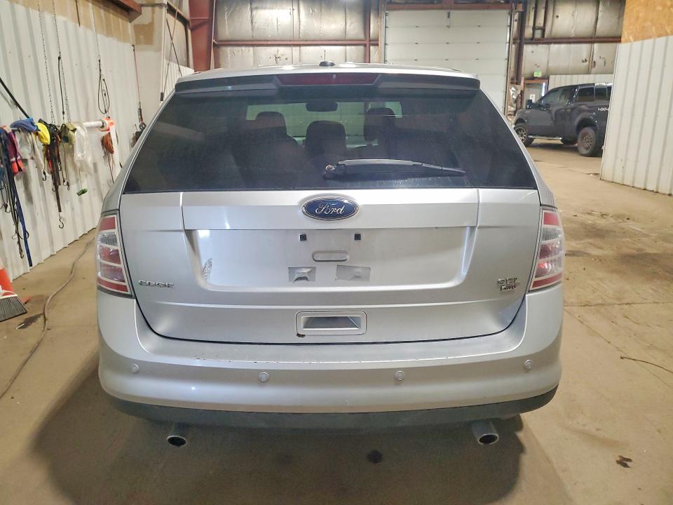 Foto 6 de la subasta – 2009 FORD EDGE con VIN 2FMDK48C39BA35558