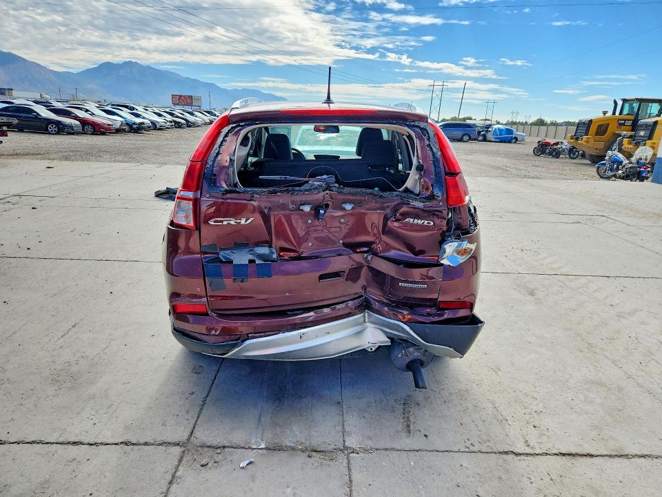 Photo 6 from auction – 2015 HONDA CR-V with VIN 5J6RM4H92FL016756