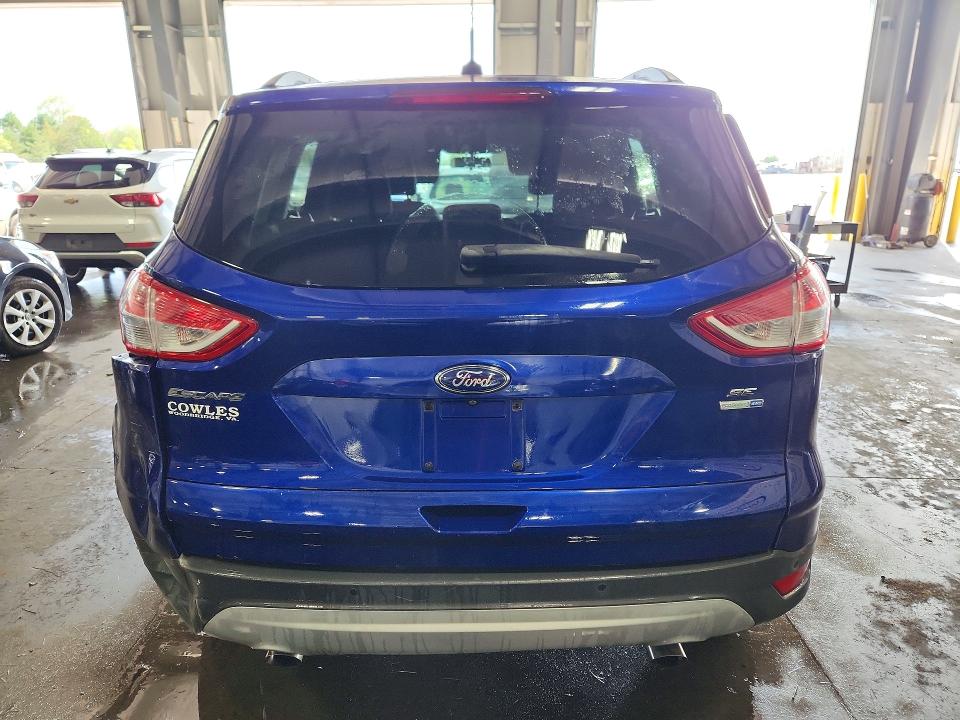 Photo 6 from auction – 2014 FORD ESCAPE with VIN 1FMCU9GX2EUD48340