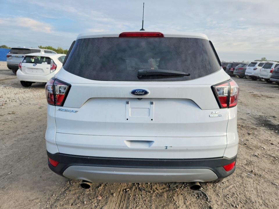 Photo 6 from auction – 2017 FORD ESCAPE with VIN 1FMCU9GD4HUB61854