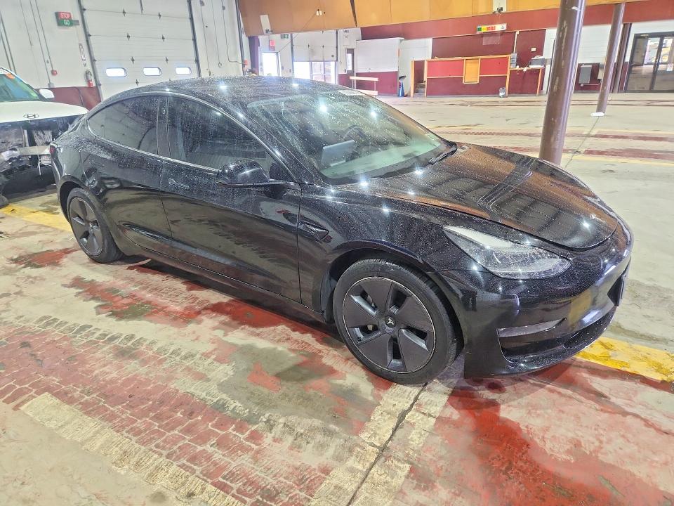 Снимка 4 от търг – 2022 TESLA MODEL 3 с VIN 5YJ3E1EB8NF120510