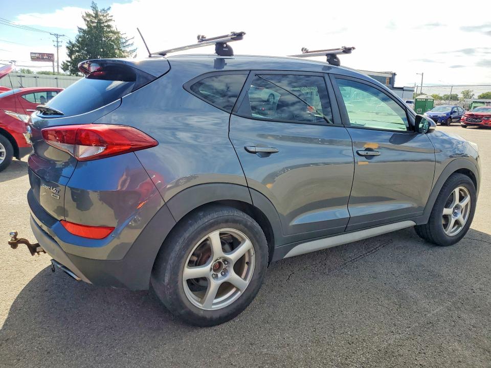 Photo 3 from auction – 2017 HYUNDAI TUCSON with VIN KM8J3CA26HU502430