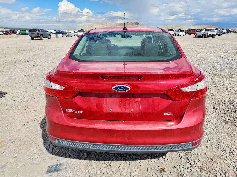 Снимка 6 от търг – 2012 FORD FOCUS с VIN 1FAHP3H26CL169227