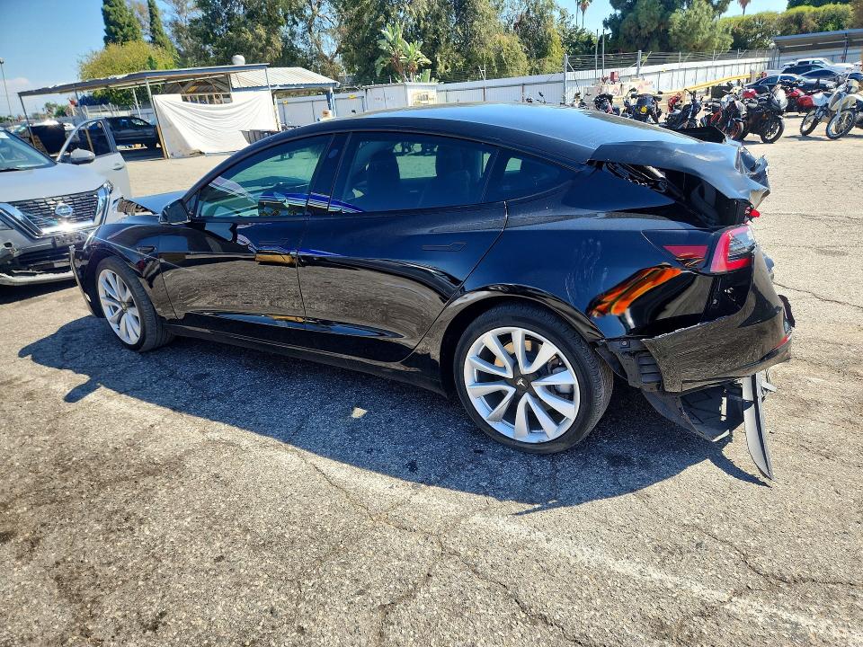 Снимка 2 от търг – 2022 TESLA MODEL 3 с VIN 5YJ3E1EB7NF164014