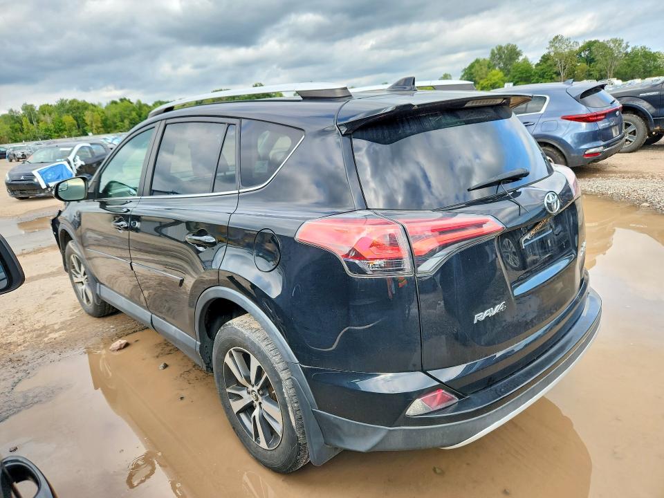 Photo 2 from auction – 2016 TOYOTA RAV4 with VIN 2T3RFREVXGW508853