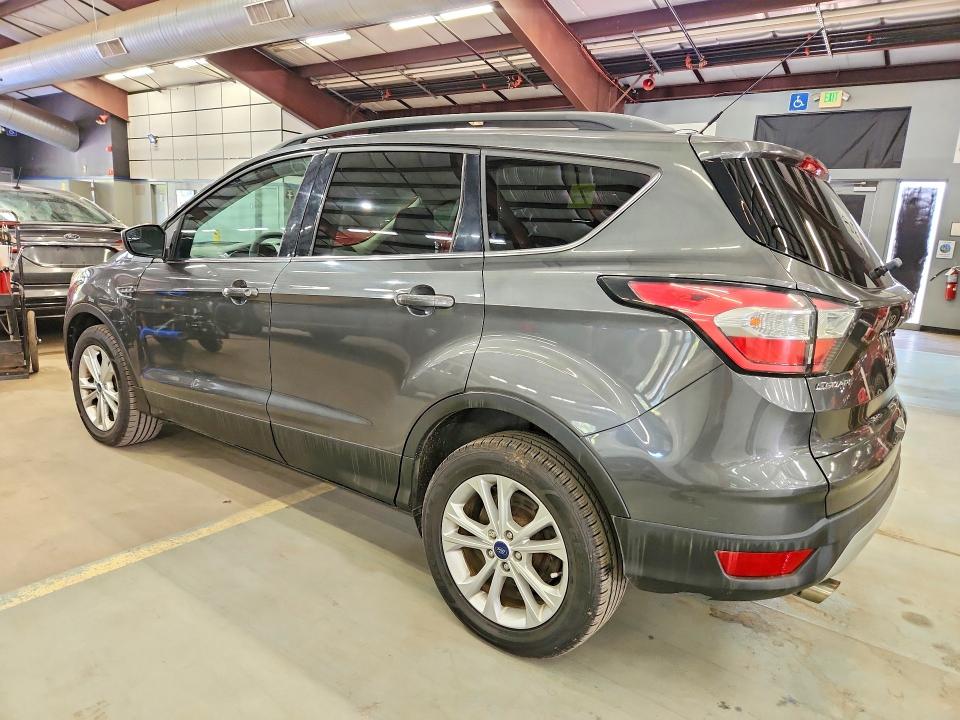 Photo 2 from auction – 2018 FORD ESCAPE with VIN 1FMCU9GD5JUA58271