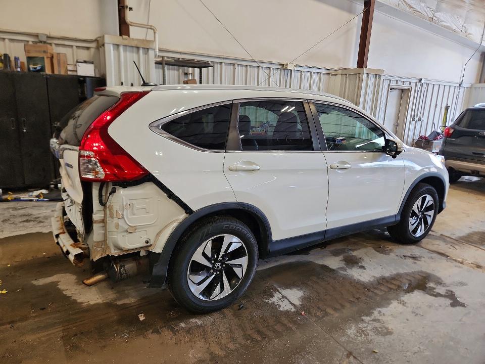 Photo 3 from auction – 2016 HONDA CR-V with VIN 5J6RM4H90GL076827