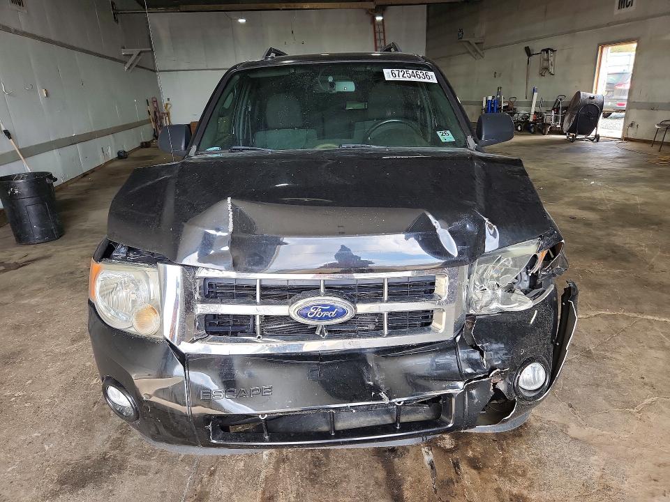 Photo 5 from auction – 2011 FORD ESCAPE with VIN 1FMCU0DG7BKA86676