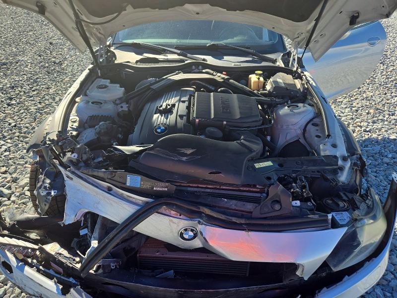 Photo 11 from auction – 2009 BMW Z4 with VIN WBALM73559E164858
