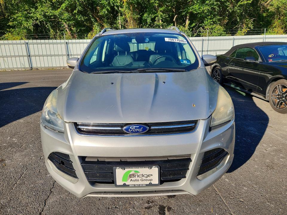 Photo 5 from auction – 2013 FORD ESCAPE with VIN 1FMCU9J97DUD63361