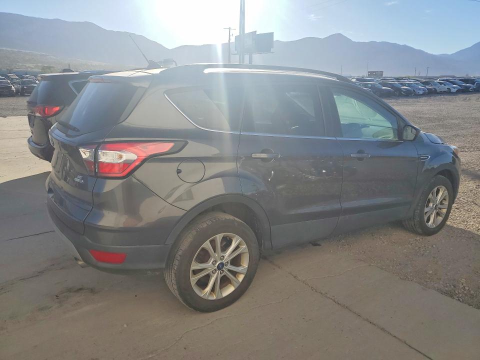 Photo 3 from auction – 2018 FORD ESCAPE with VIN 1FMCU9GDXJUD04943