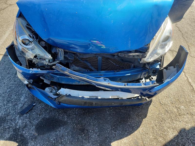 Photo 11 from auction – 2015 TOYOTA PRIUS C with VIN JTDKDTB3XF1106352
