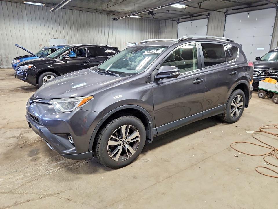 TOYOTA RAV4 2018 with VIN JTMRFREV0JJ261395 - Photo from auction