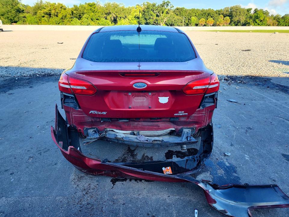 Снимка 6 от търг – 2016 FORD FOCUS с VIN 1FADP3F20GL292674