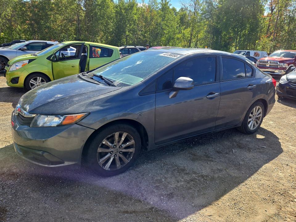 HONDA CIVIC 2012 с VIN 2HGFB2F9XCH057068 - Снимка от търг