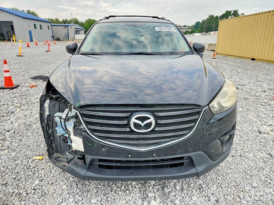 Photo 5 from auction – 2016 MAZDA CX-5 with VIN JM3KE4CY2G0639095