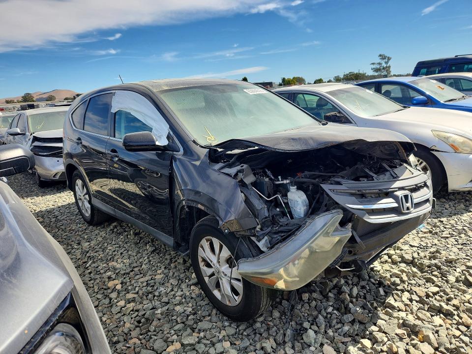 Photo 4 from auction – 2014 HONDA CR-V with VIN 2HKRM3H51EH565929