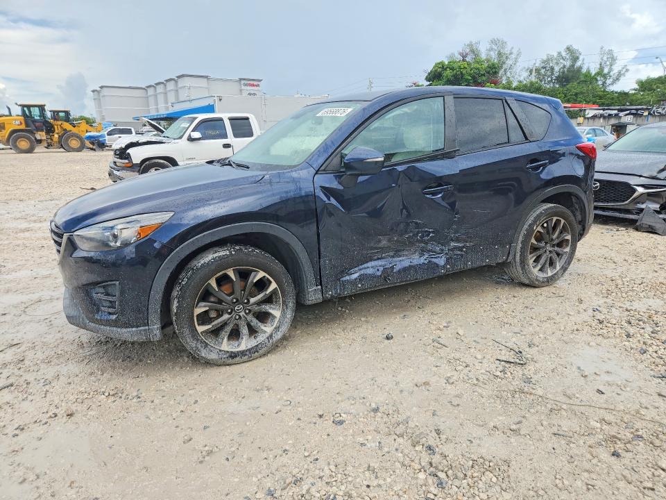 MAZDA CX-5 2016 с VIN JM3KE4DY2G0629956 - Снимка от търг