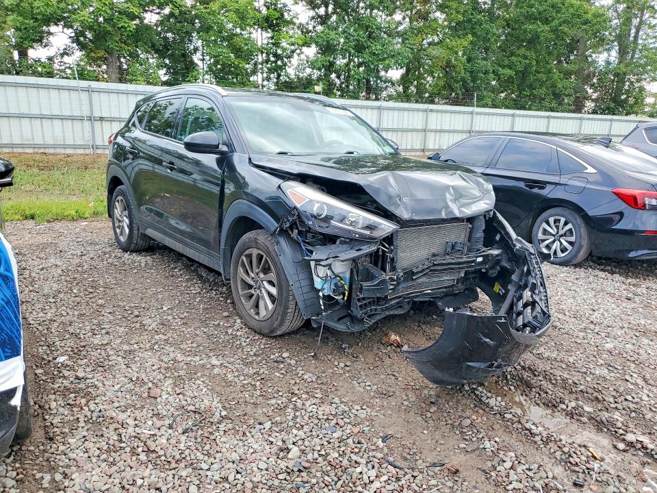 Снимка 4 от търг – 2016 HYUNDAI TUCSON с VIN KM8J3CA41GU236153