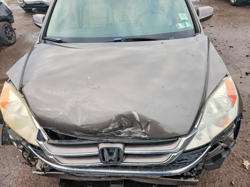 Photo 11 from auction – 2010 HONDA CR-V with VIN 5J6RE4H76AL071568