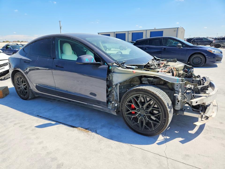 Photo 4 from auction – 2022 TESLA MODEL 3 with VIN 5YJ3E1EC3NF209071