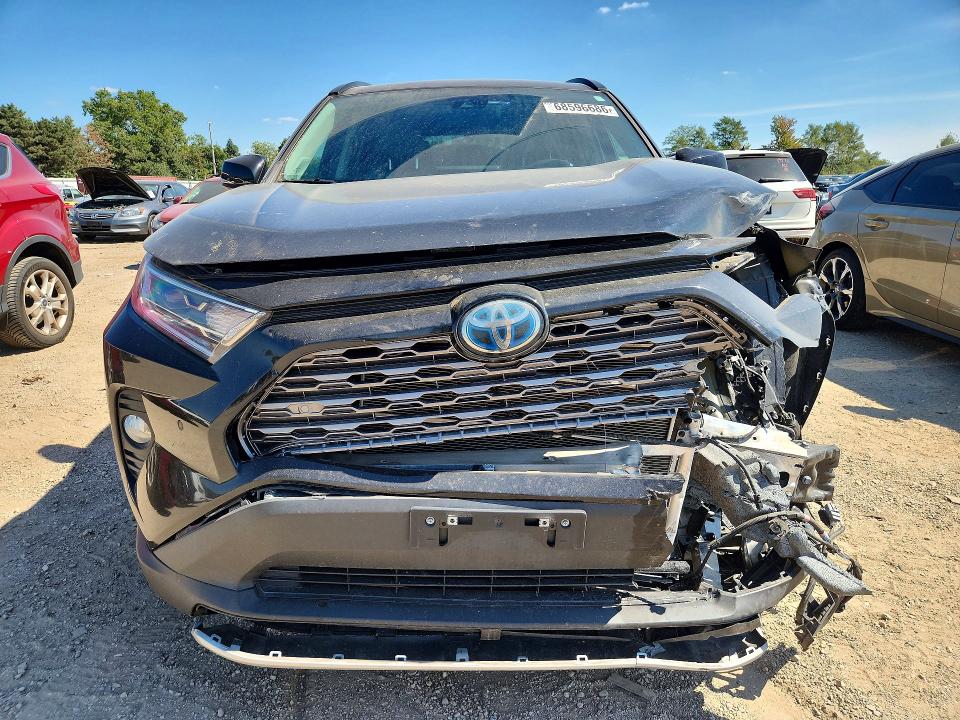 Photo 5 from auction – 2021 TOYOTA RAV4 with VIN 4T3D6RFV8MU037127
