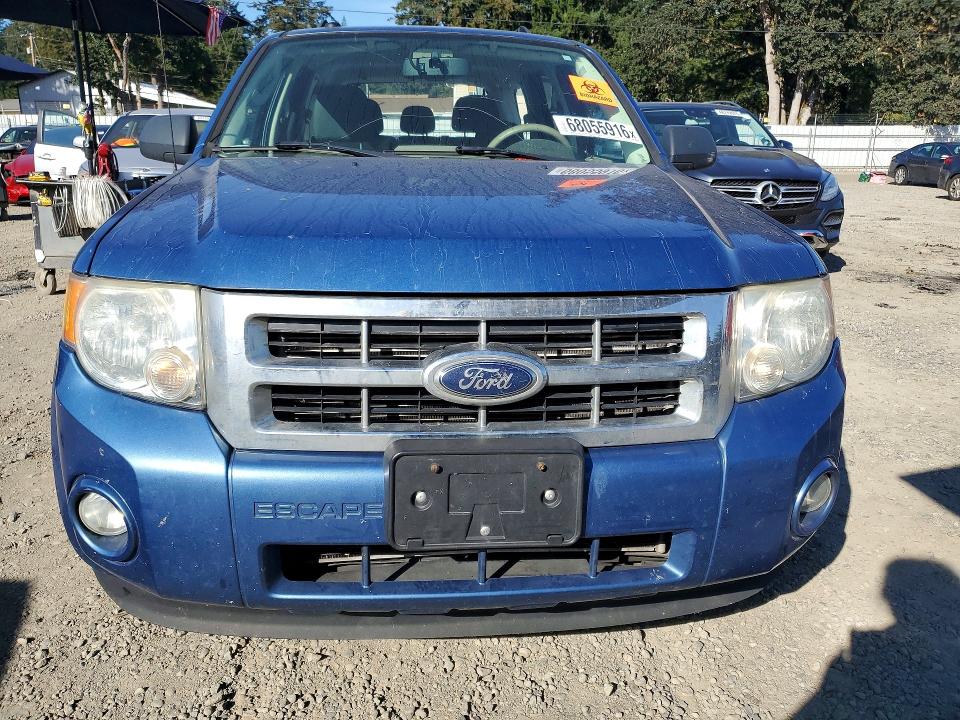 Photo 5 from auction – 2010 FORD ESCAPE with VIN 1FMCU0D76AKA31120