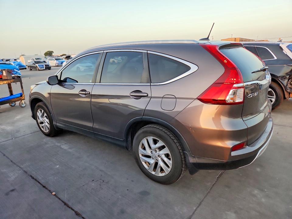 Снимка 2 от търг – 2016 HONDA CR-V с VIN 2HKRM3H70GH565506